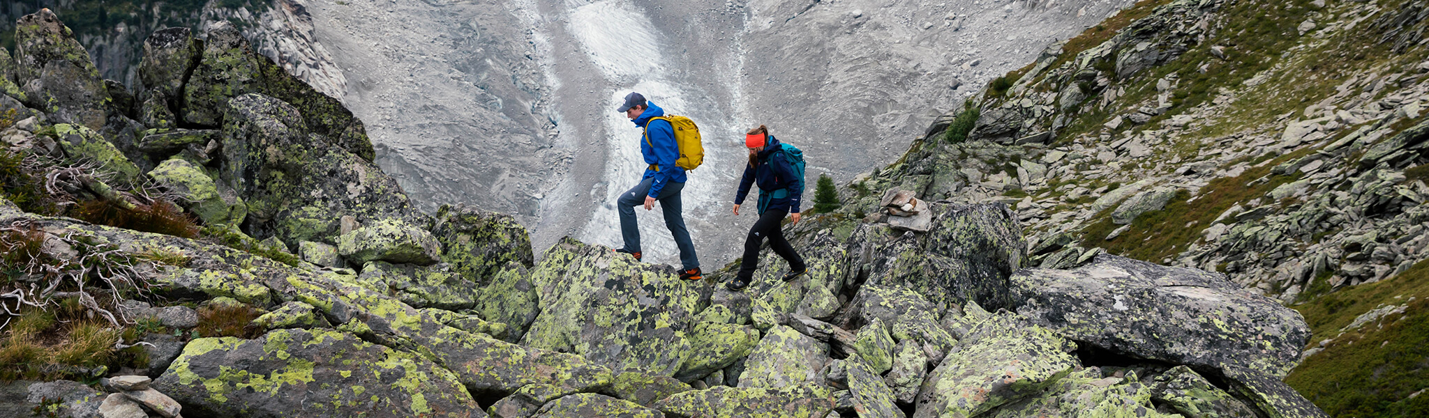 Two people scrambling in Mountain Equipment clothing 