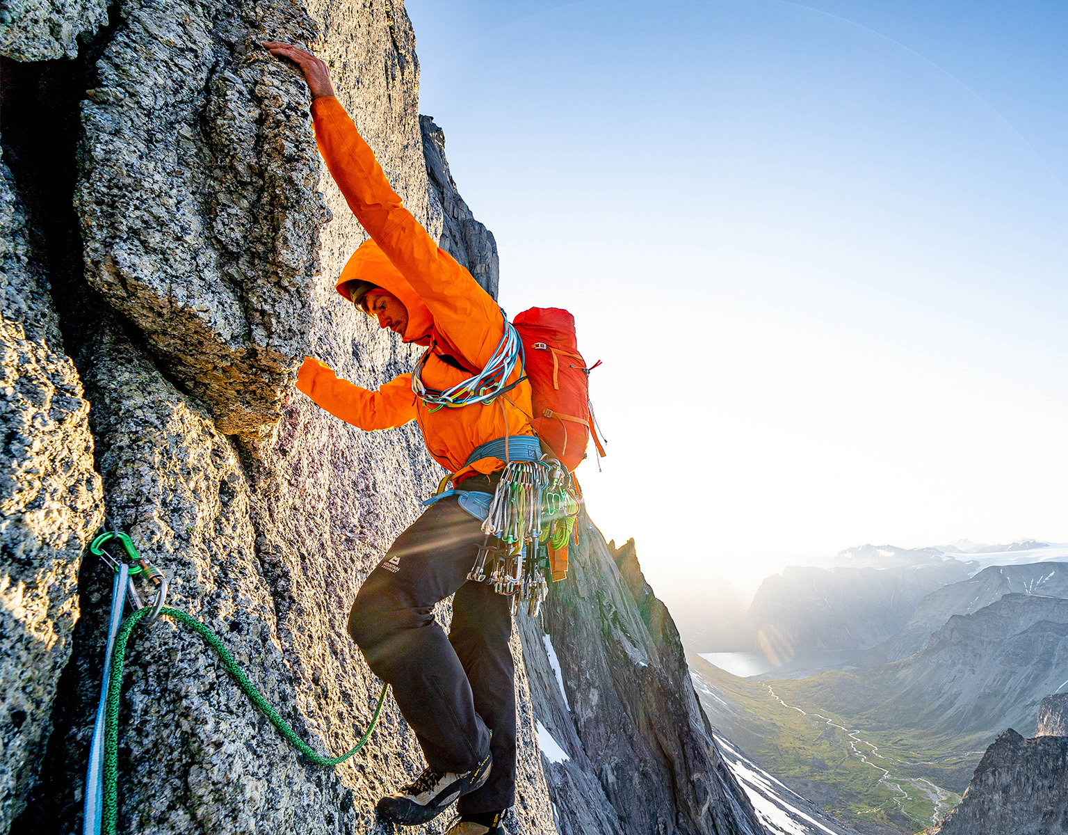 man climbing a mountain