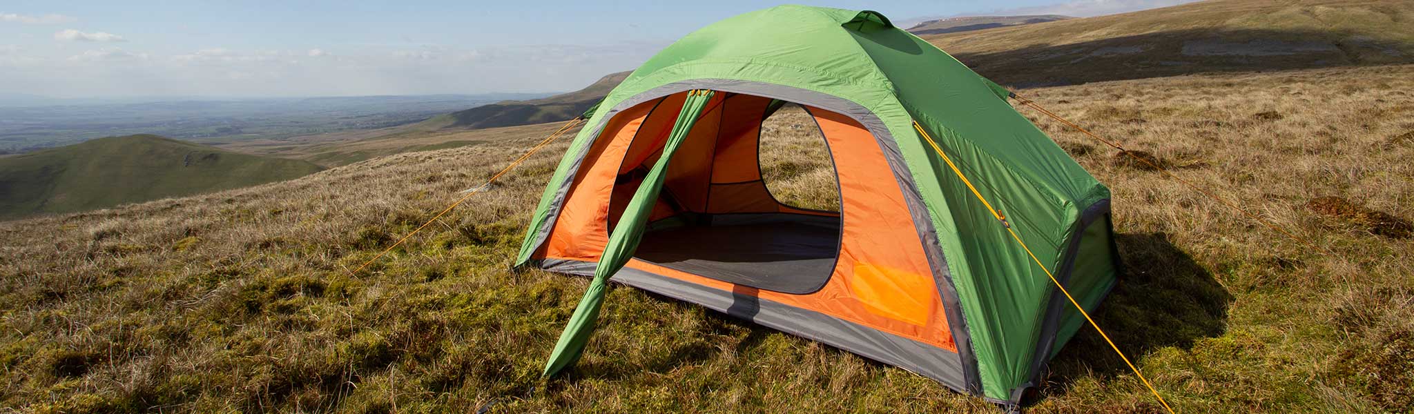 An image of a Vango tent pitched in a sunny field