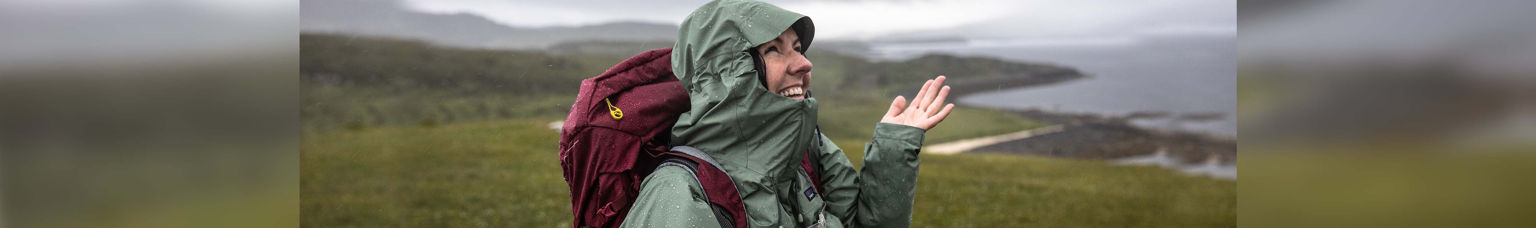 A woman in a waterproof jacket