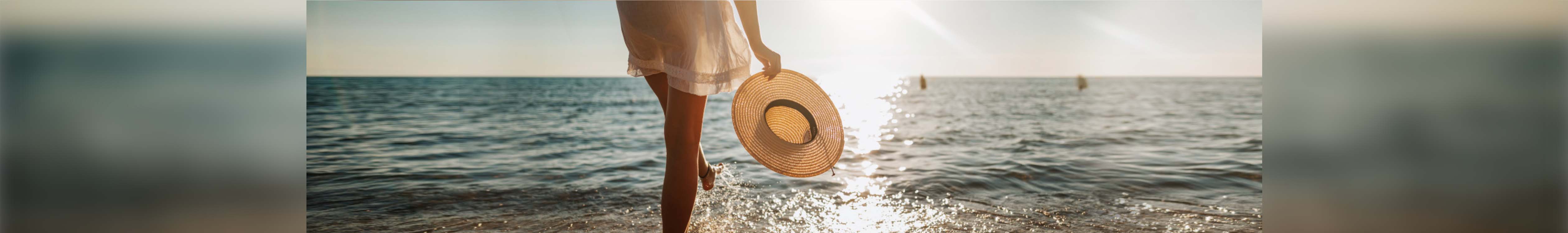 Woman walking on beach