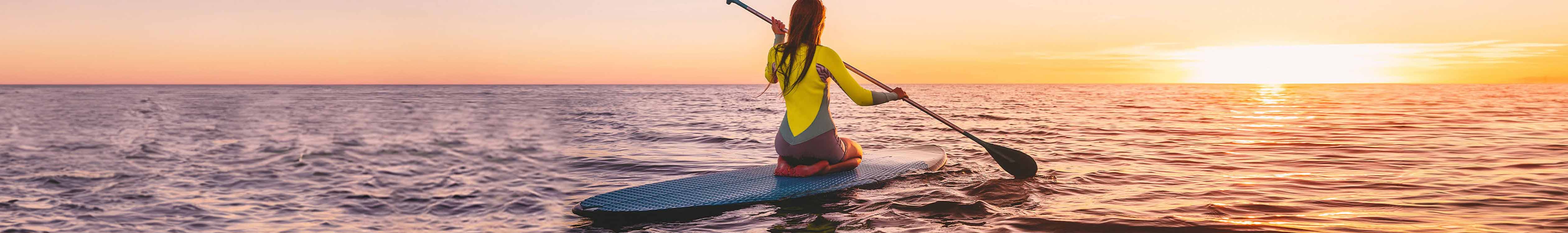 Woman paddleboarding