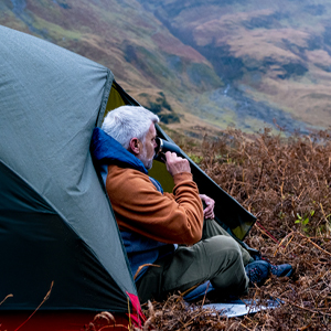 Man sitting in a tent