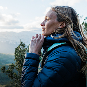 Woman wearing jacket walking in the outdoors