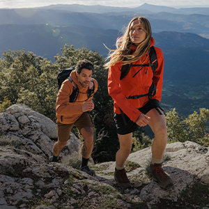 2 walkers hikimg up a mountain