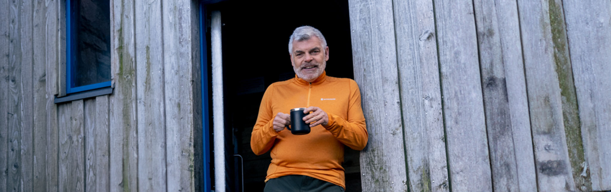 A man wearing a half zip fleece