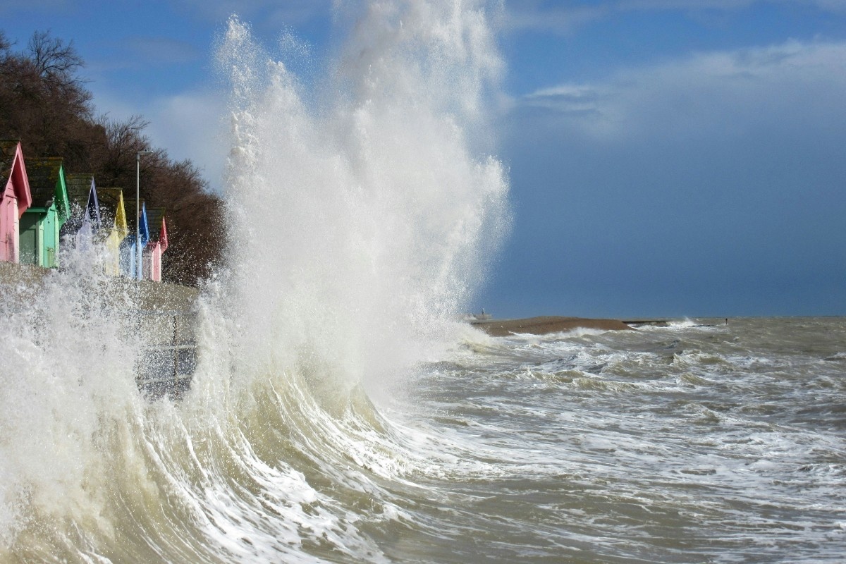 The waves crashing on the shore of Folkestone beach 