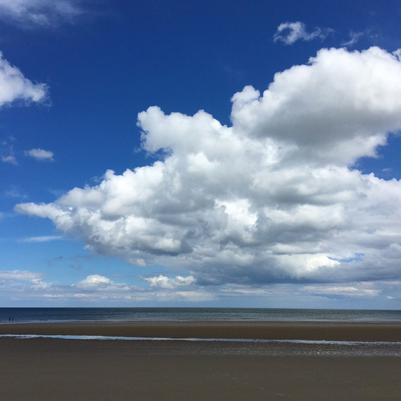 Blue sky and clouds over Holkham beach