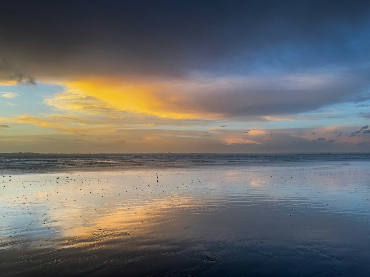 The sun setting over West Wittering Beach