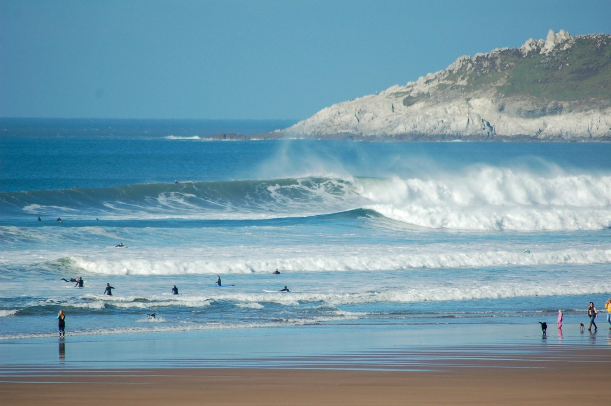 People surfing at Woolacombe Beach