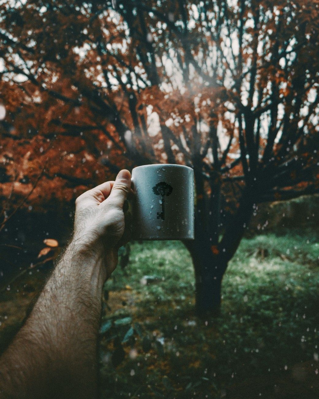 Camping in the wet weather with a coffee 