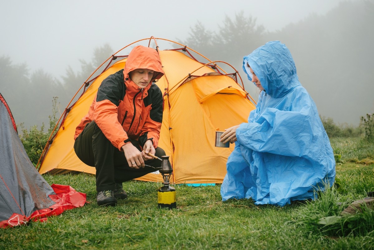 A couple camping in the rain 