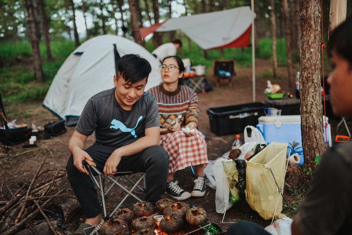 Family cooking around the campsite 