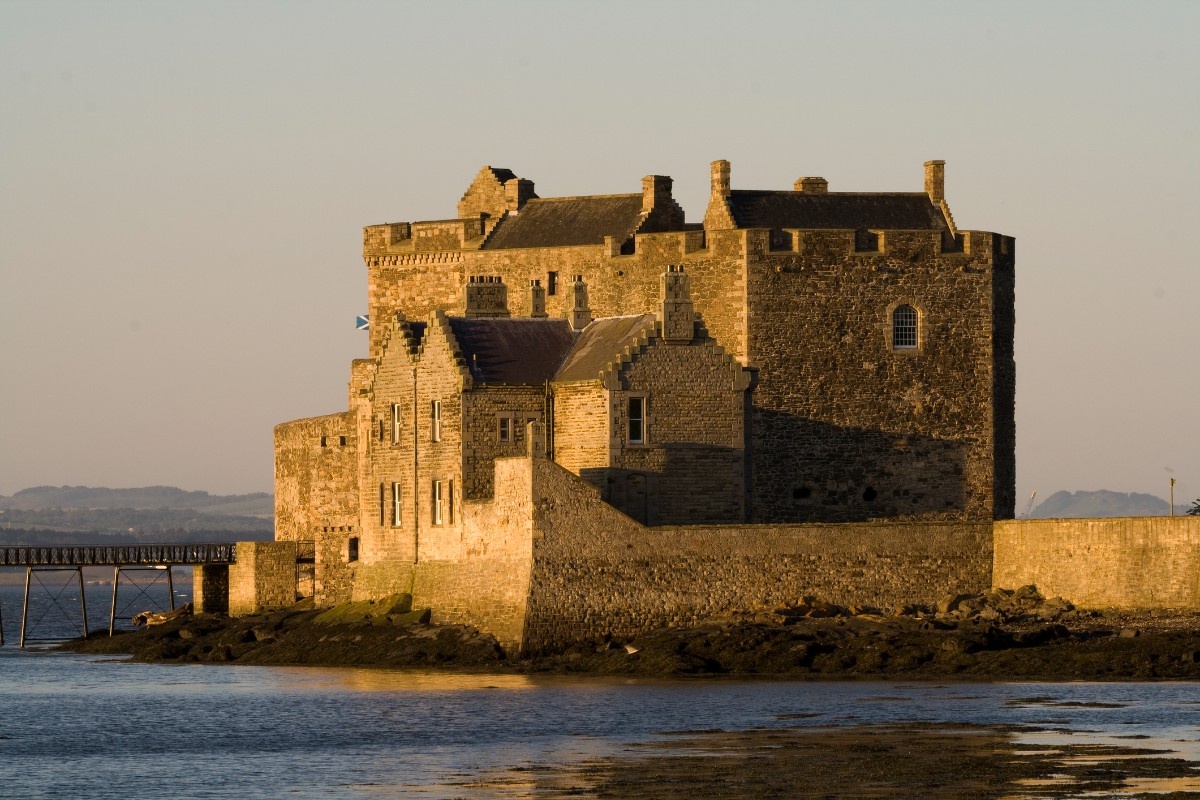 An image of Blackness Castle and its surrounding waters