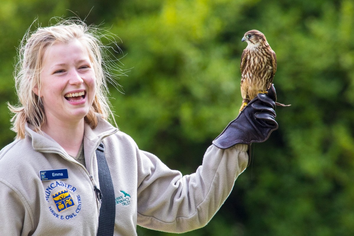 A woman at the Owl and Hawk House at Muncaster Castle 