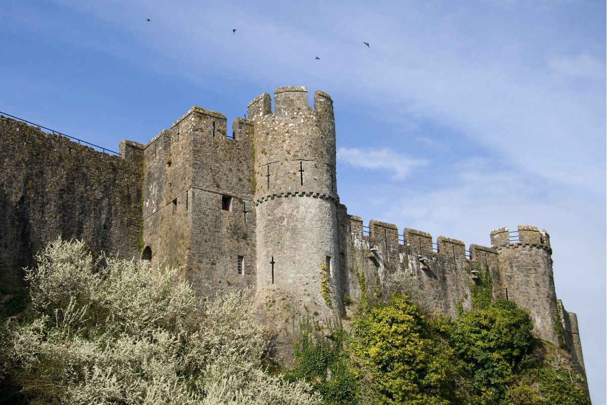 The towers and high walls of Pembroke Castle 