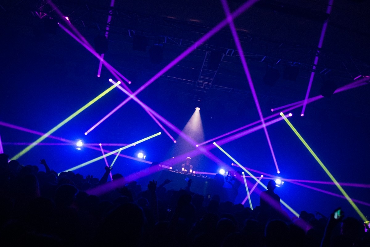 Purple lasers over the crowd at Creamfields festival 