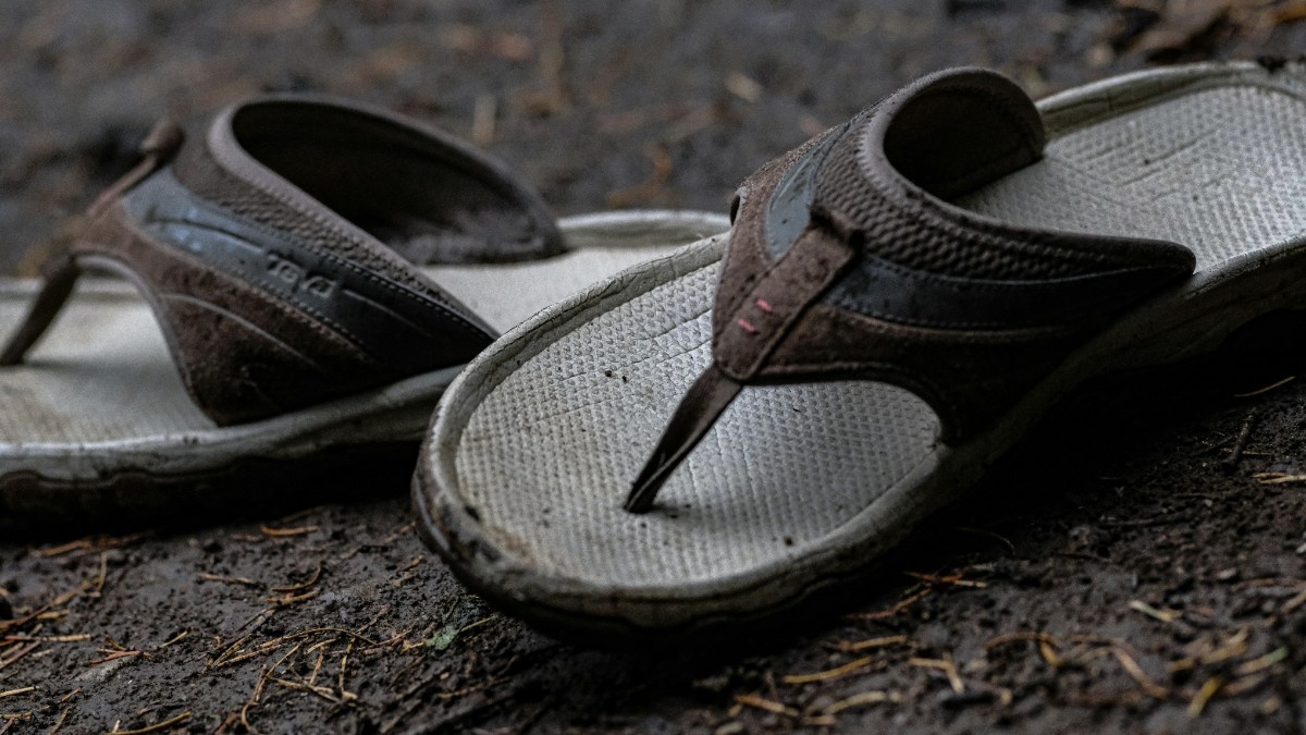 A pair of Teva hiking flip flops