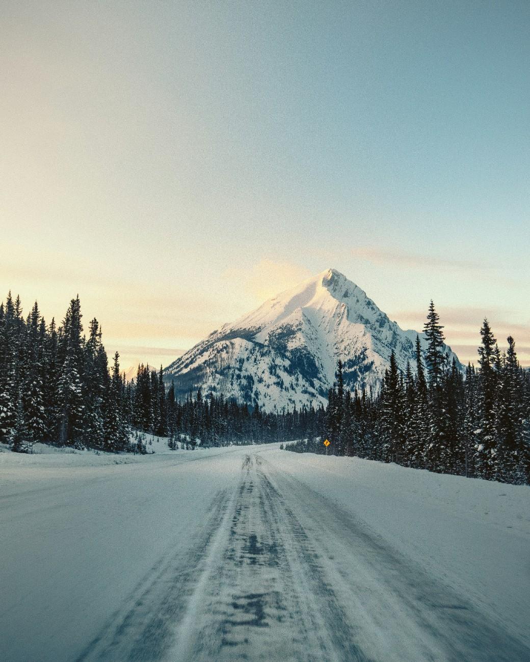 A road through Banff covered in Snow in the Winter 