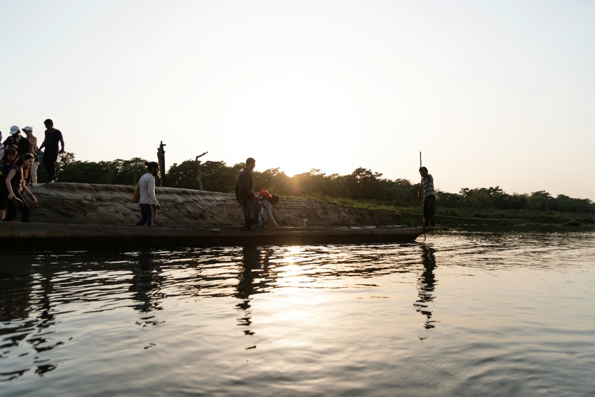 People playing in the waters of Chitwan National Park 