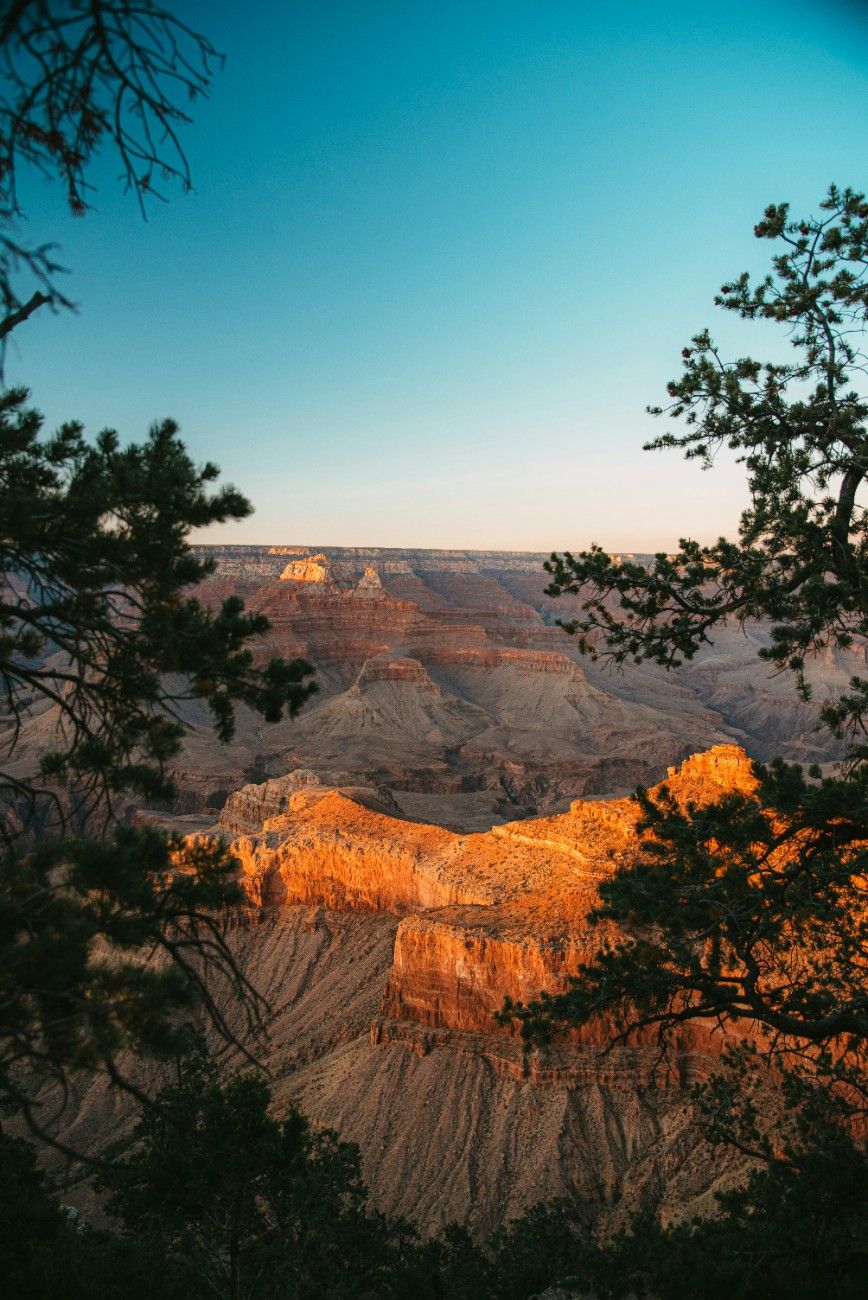 The sun setting over the Grand Canyon 