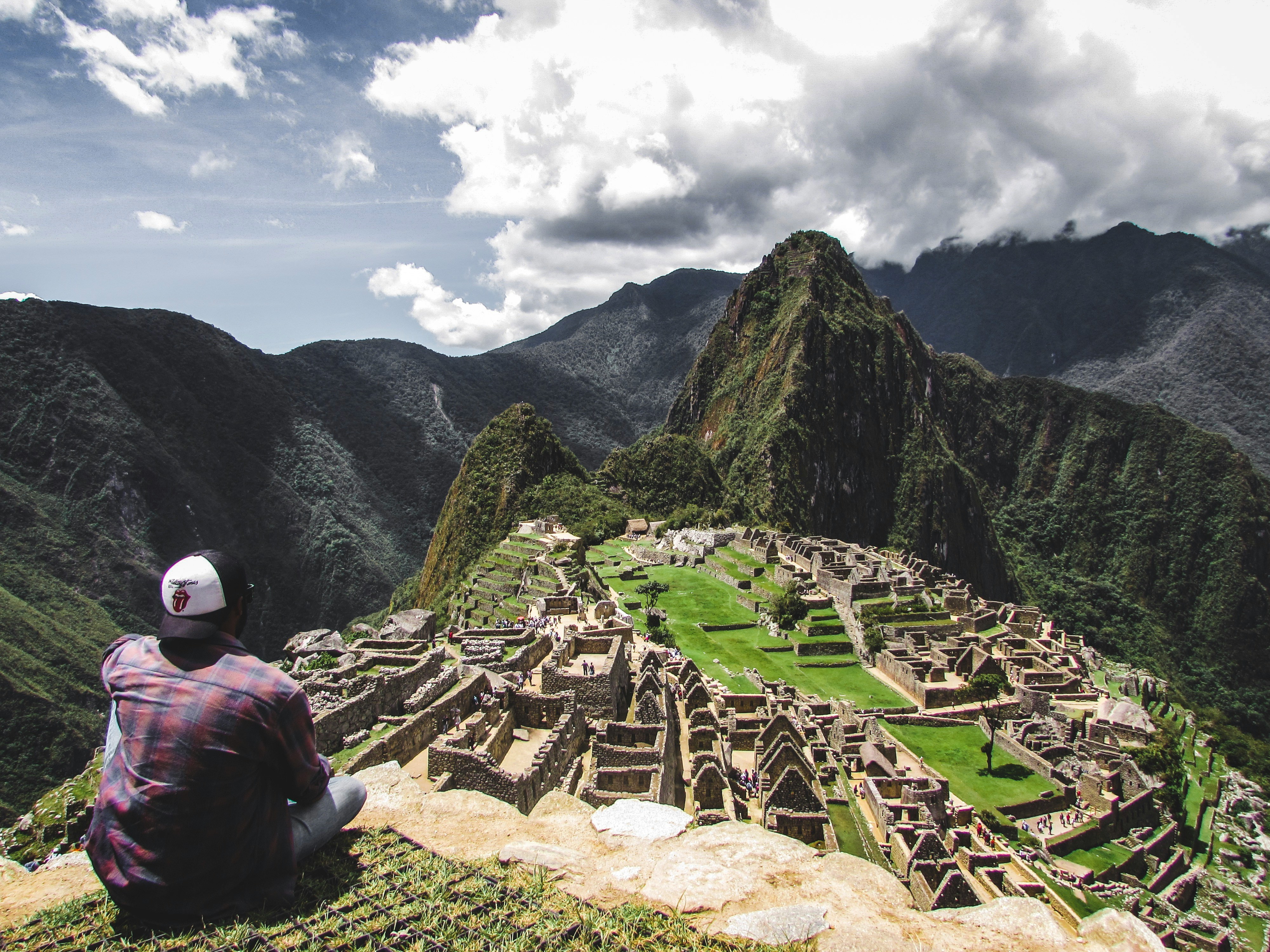 A man sat at Machu Picchu