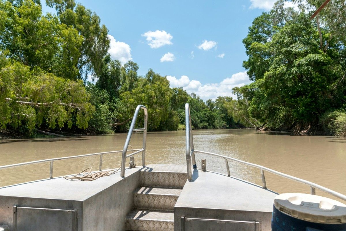 A boat going through some water in Kakadu 