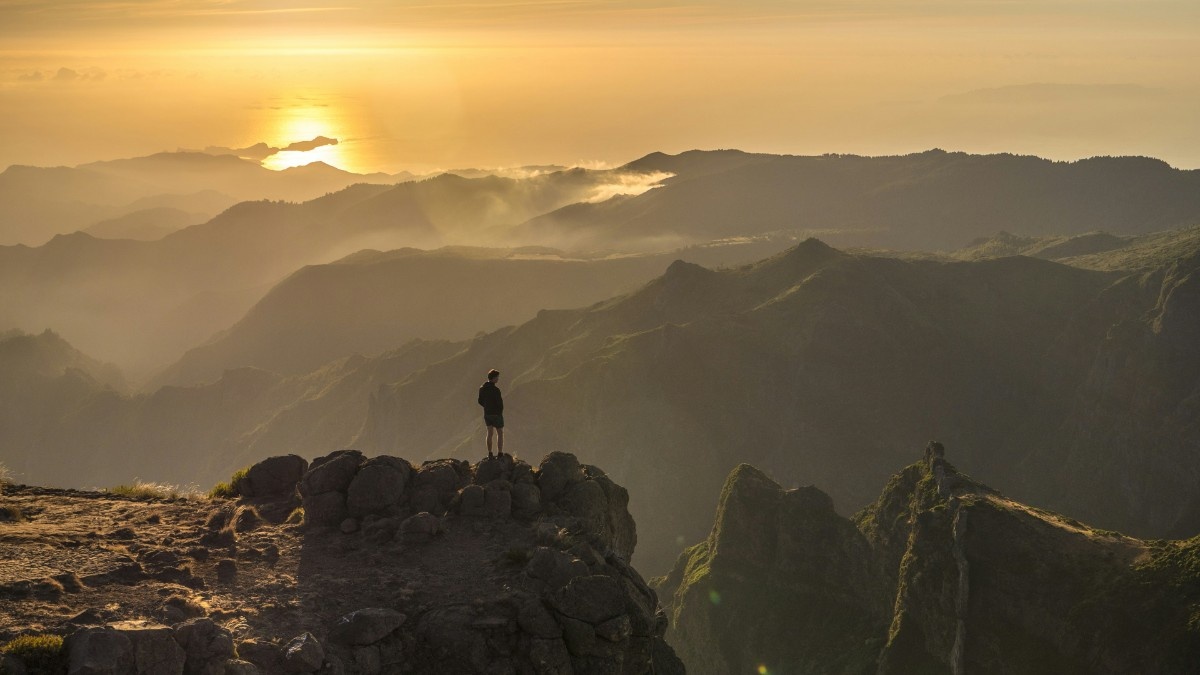 A man stood atop a cliff in Madeira