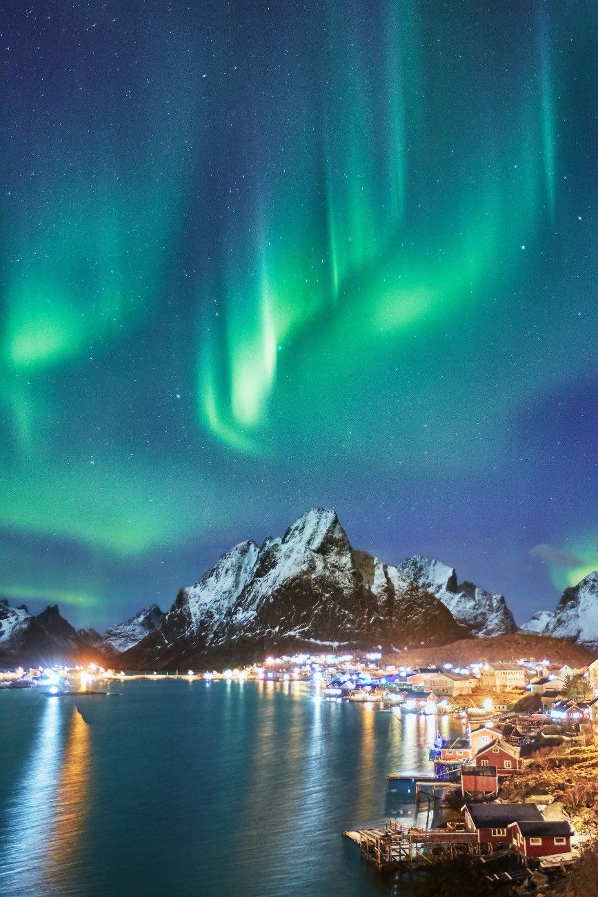 Aurora Borealis (The Northern Lights) over a town 