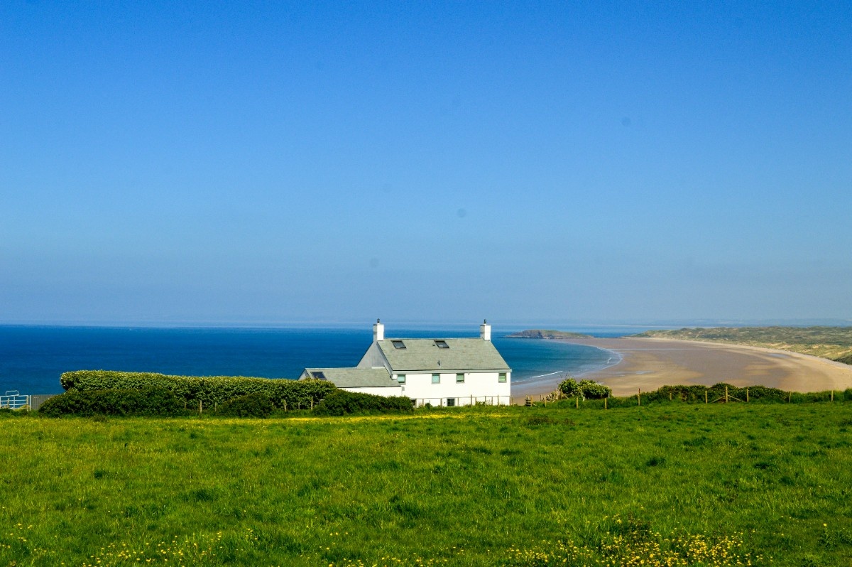 A white cottage above Rhossili Bay