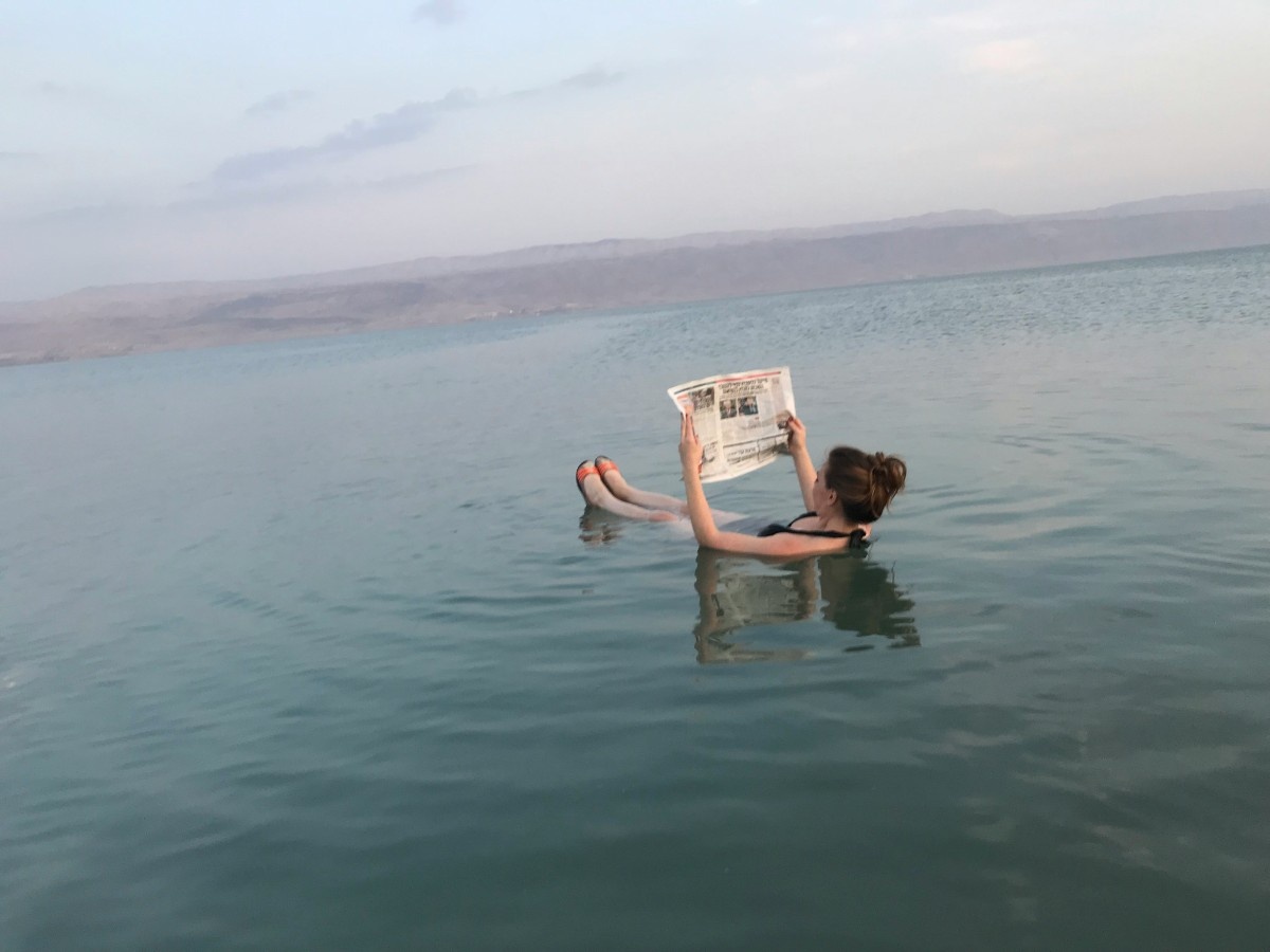 A woman floating on The Dead Sea