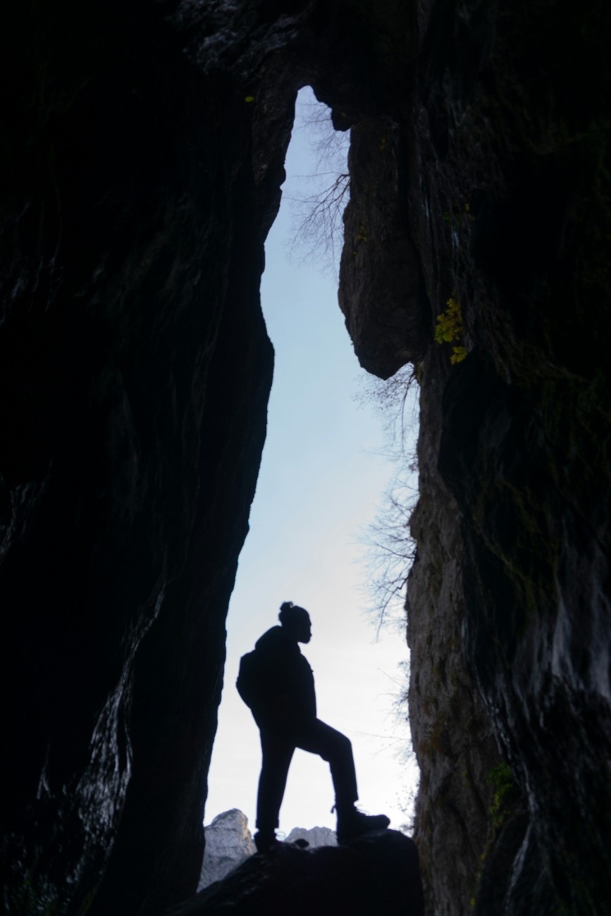 A man in a cave in Triglav 