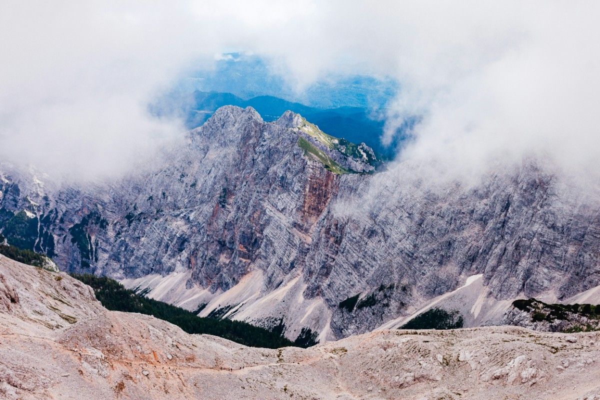 Triglav's rocky landscape through the clouds