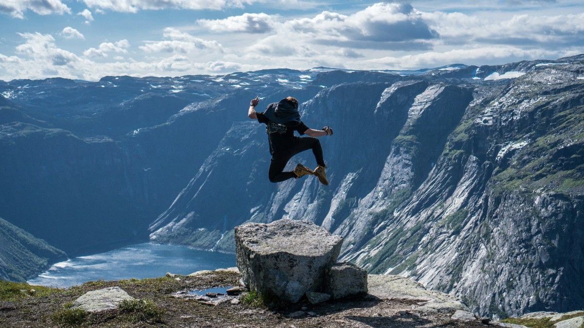 A person jumping at Trolltunga in Norway