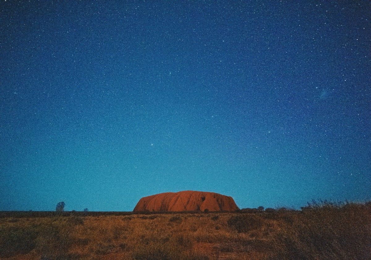 Uluru Mountain at nighttime 