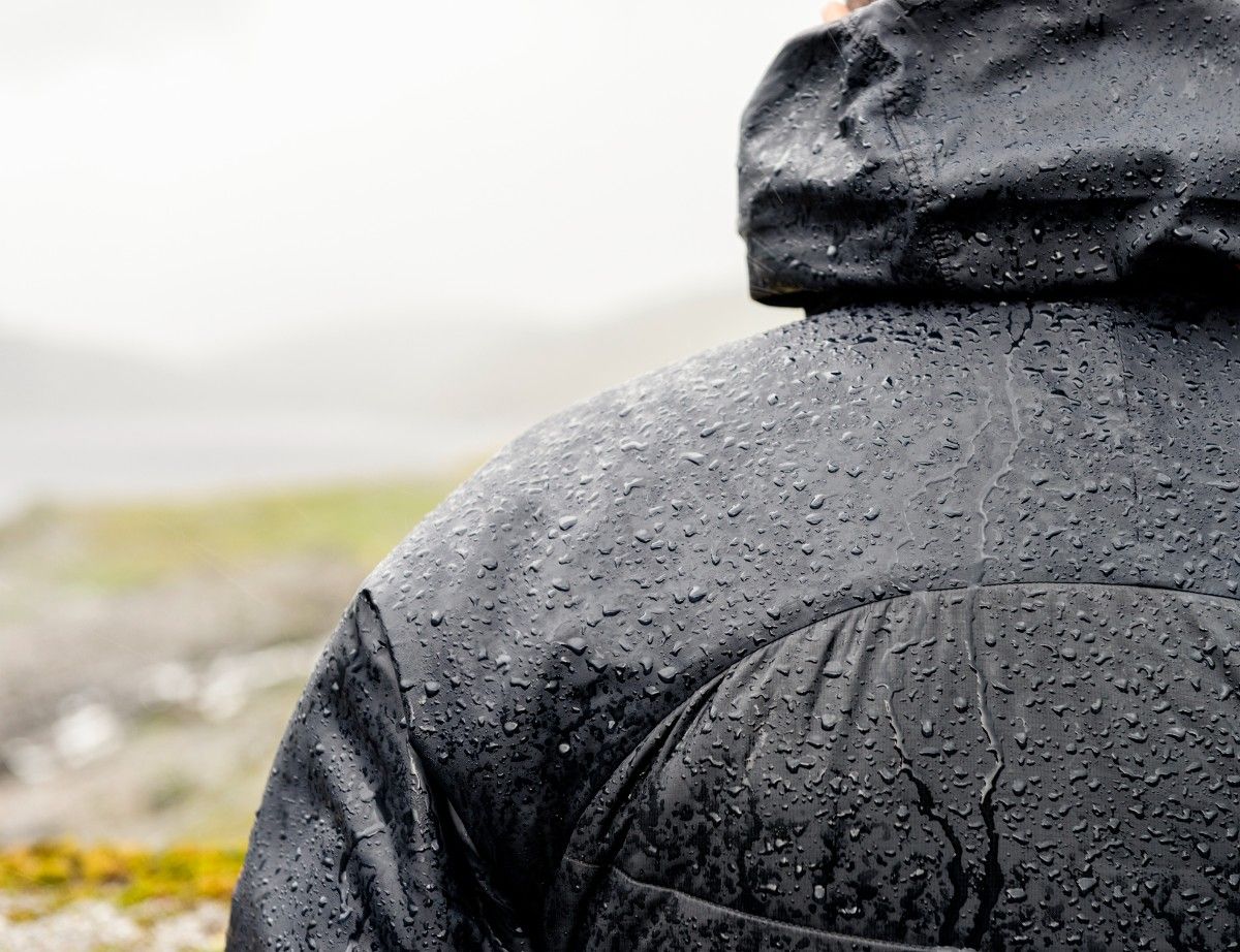 Rain droplets forming on a waterproof jacket b