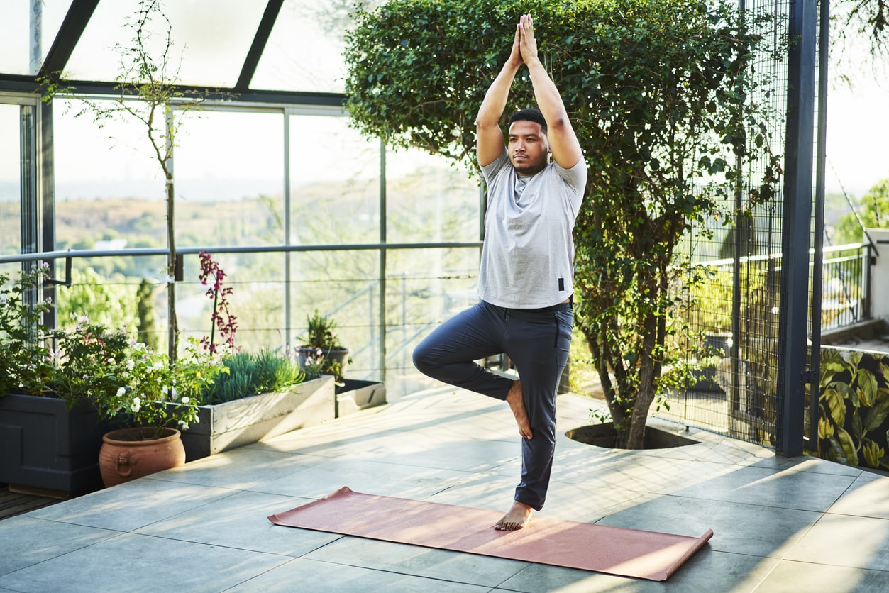 man doing yoga