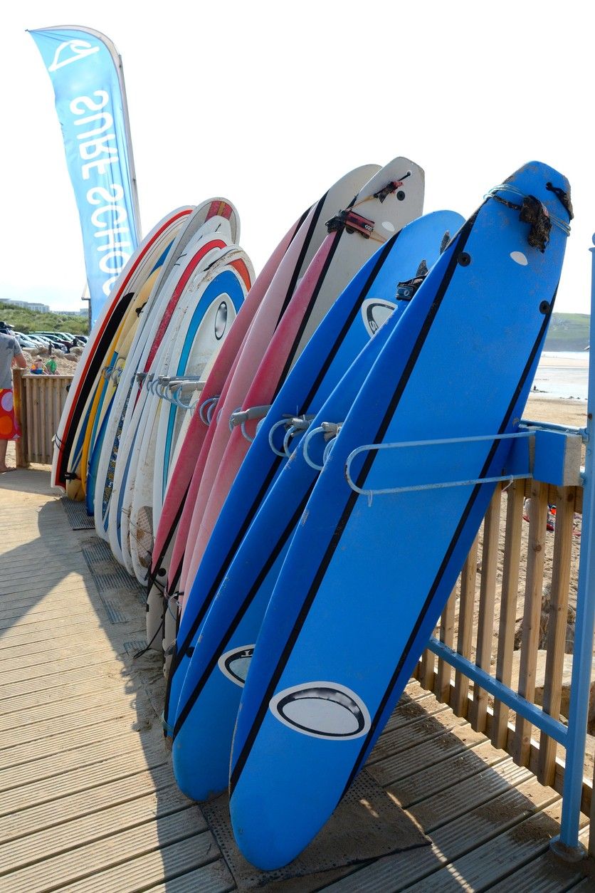 row of surfboards