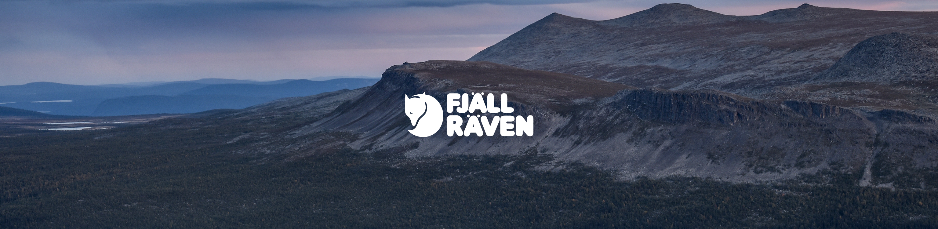 Hills with the Fjallraven brand logo in the middle