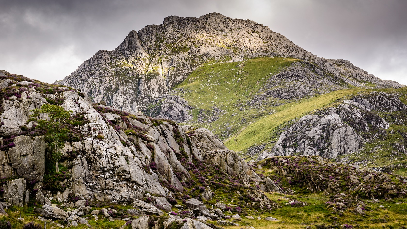 Tryfan, Moody Mountain landscape scene in North Wales, Snowdonia National Park. Ogwen, profile of giant's head in the mountain.